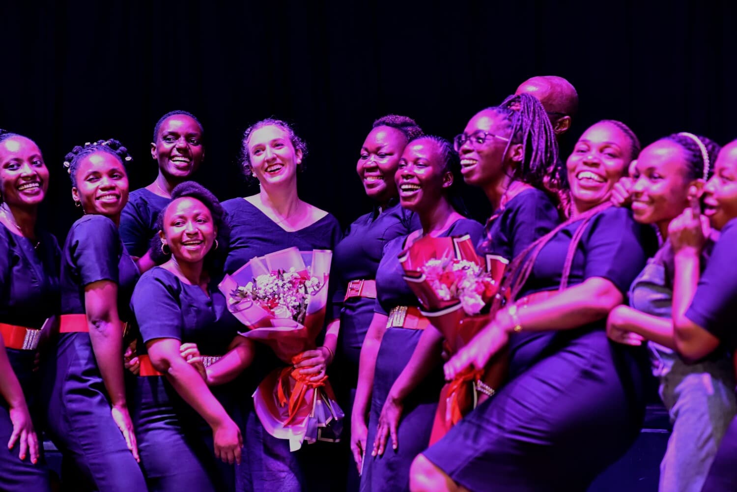 Celebration after a TPS performance with bouquets and joy