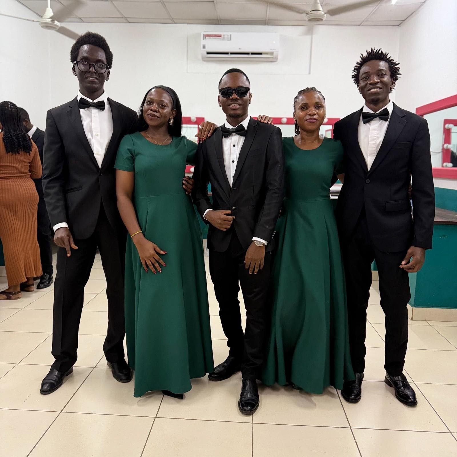 Intimate formal ensemble portrait before a romantic programme